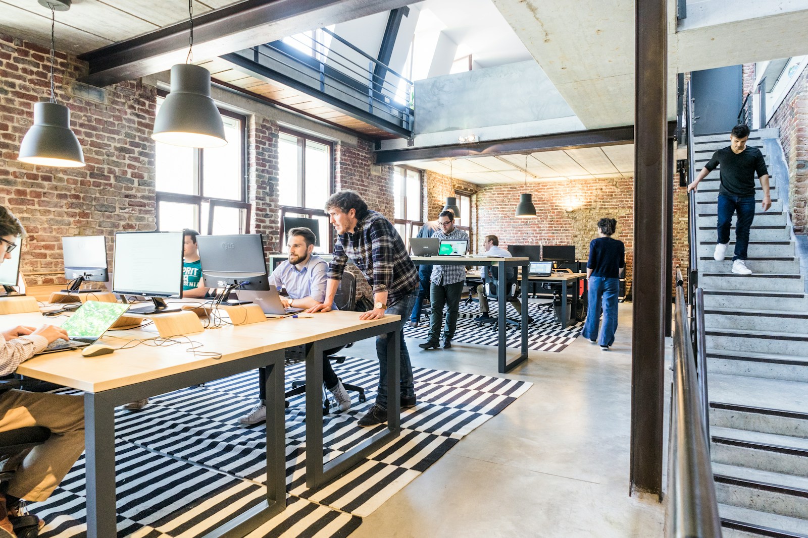 Professional IT team collaborating in a modern office